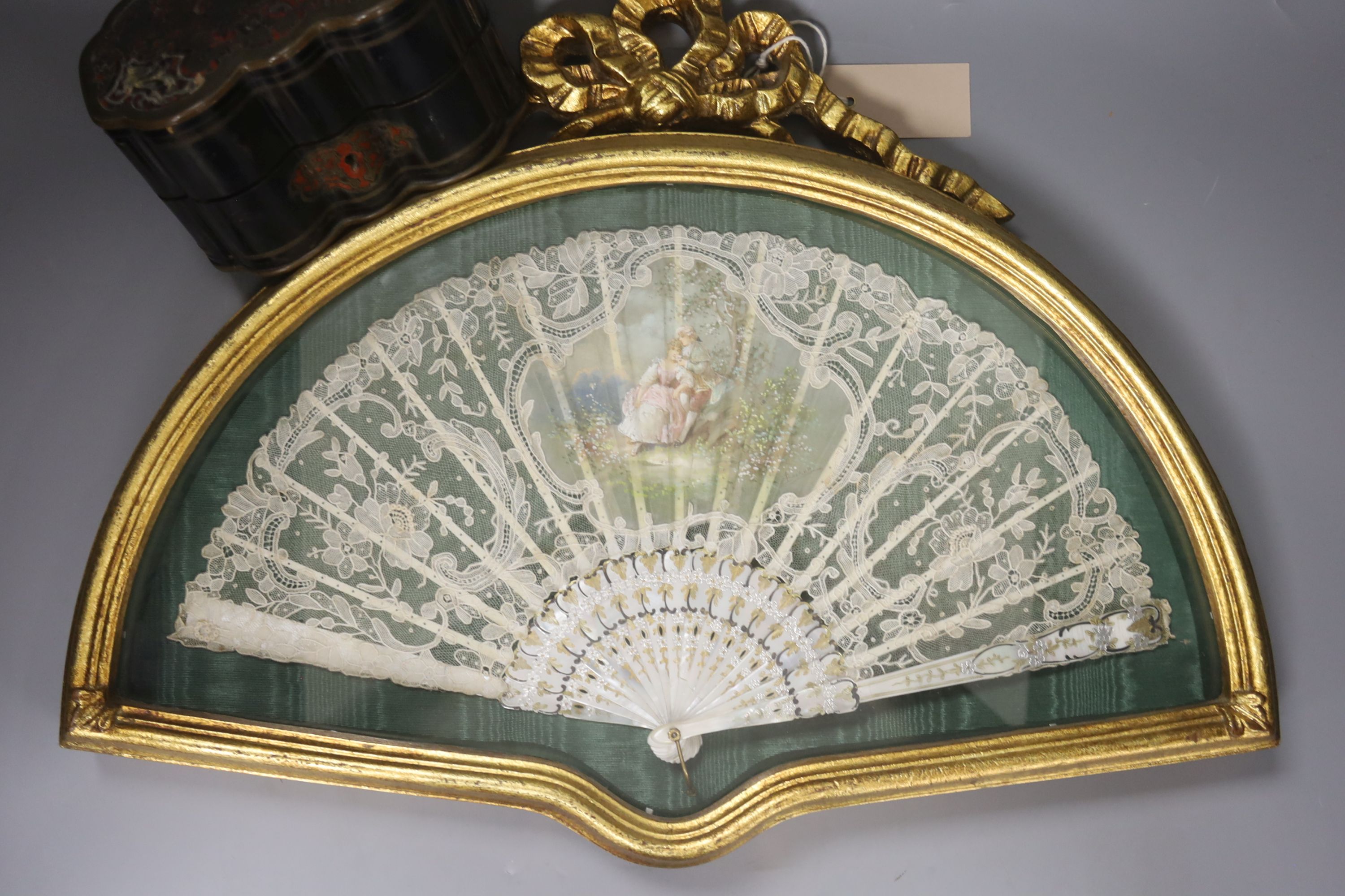 A 19th century mother of pearl and Brussels point de gaze lace fan, with painted panel (framed) and a pair of 19th century French glass scent bottles